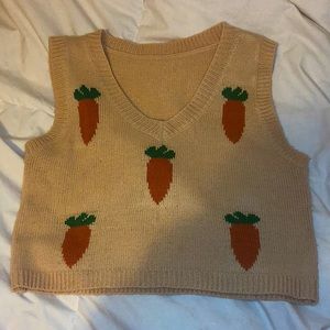 Xs women’s v neck carrot sweater vest, slightly cropped.